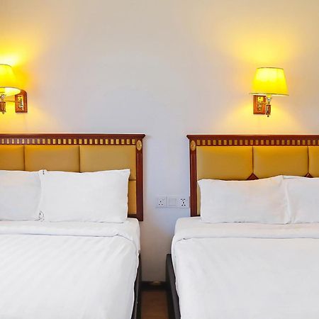 Super Oyo 90464 Borneo Suites Hotel Kota Kinabalu Extérieur photo