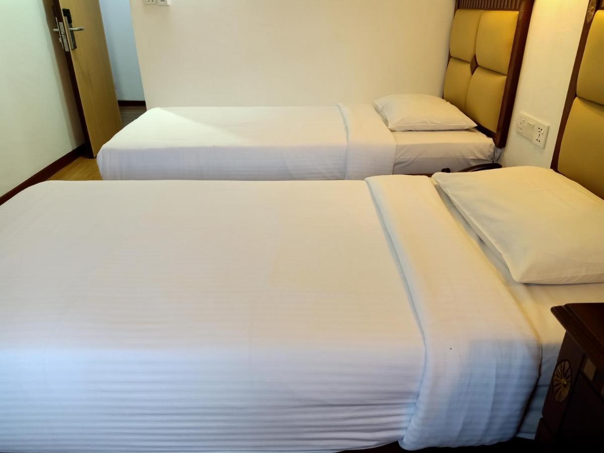 Super Oyo 90464 Borneo Suites Hotel Kota Kinabalu Extérieur photo