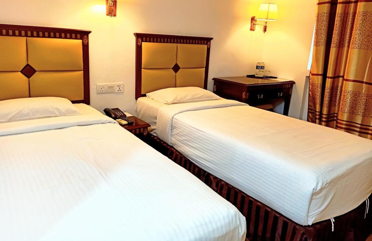 Super Oyo 90464 Borneo Suites Hotel Kota Kinabalu Extérieur photo