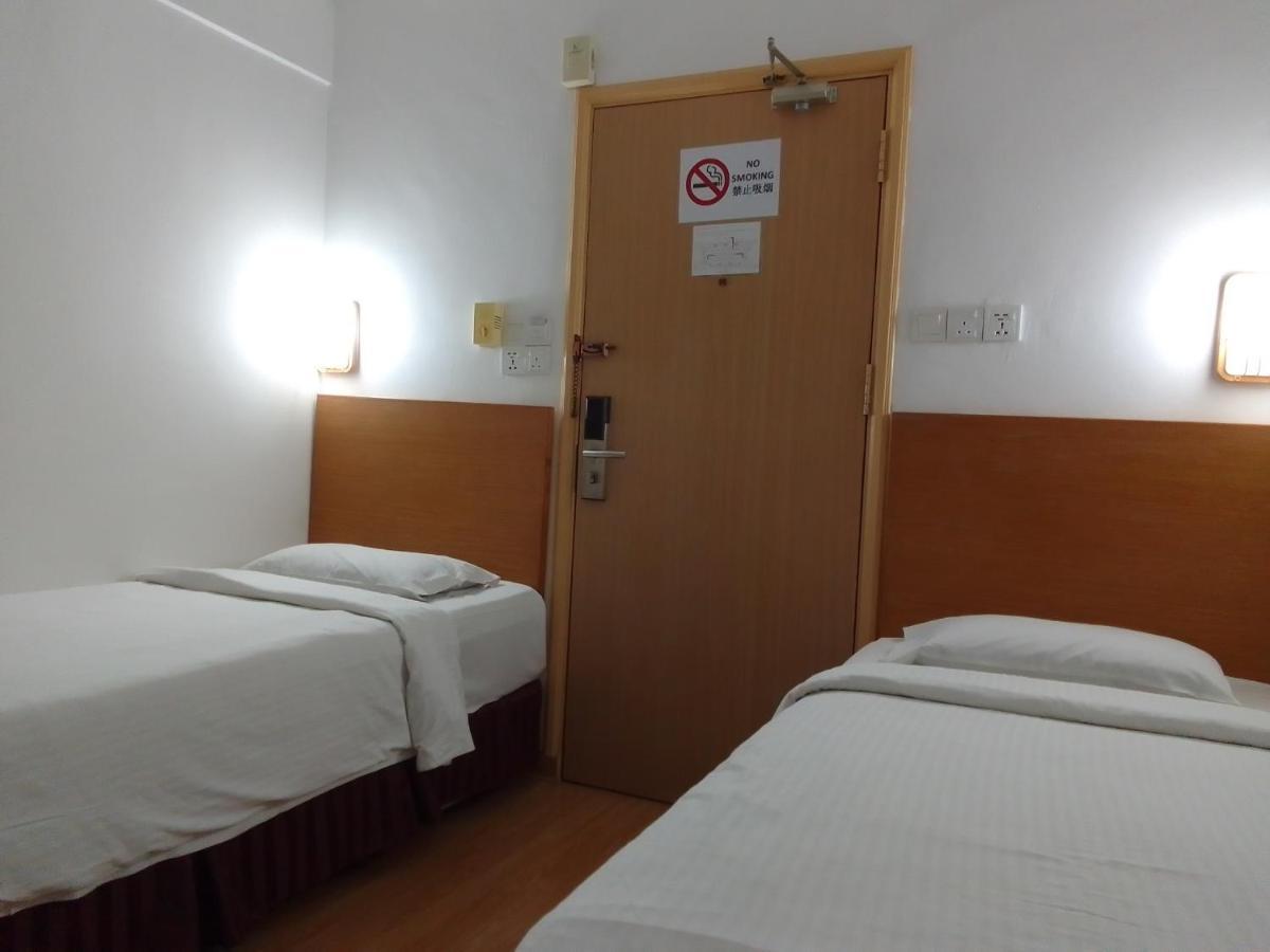 Super Oyo 90464 Borneo Suites Hotel Kota Kinabalu Extérieur photo