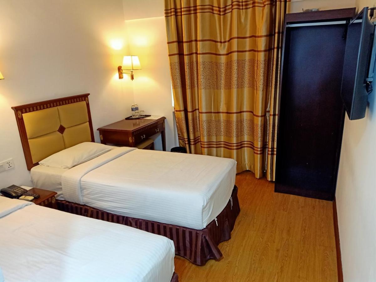 Super Oyo 90464 Borneo Suites Hotel Kota Kinabalu Extérieur photo