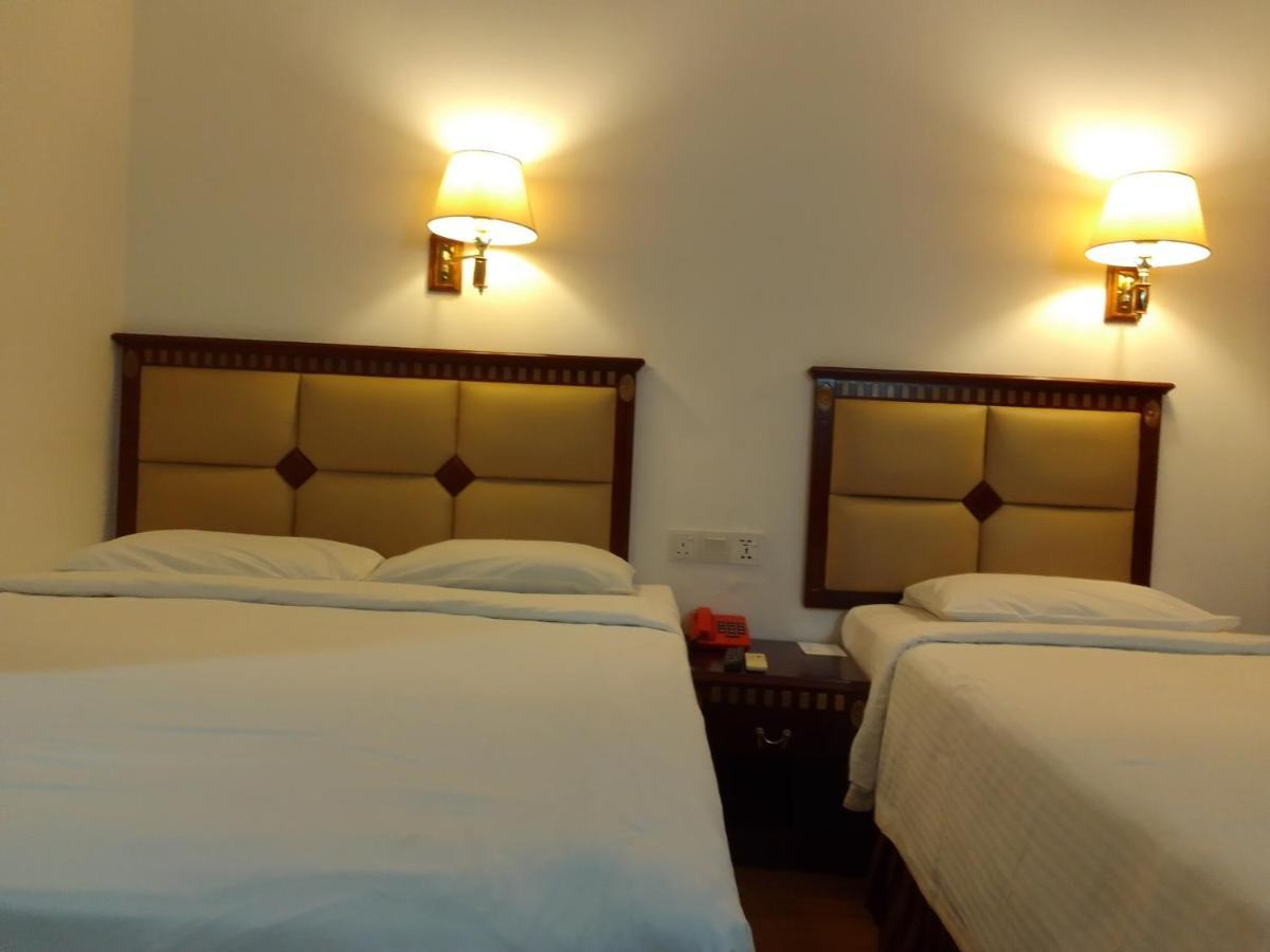 Super Oyo 90464 Borneo Suites Hotel Kota Kinabalu Extérieur photo