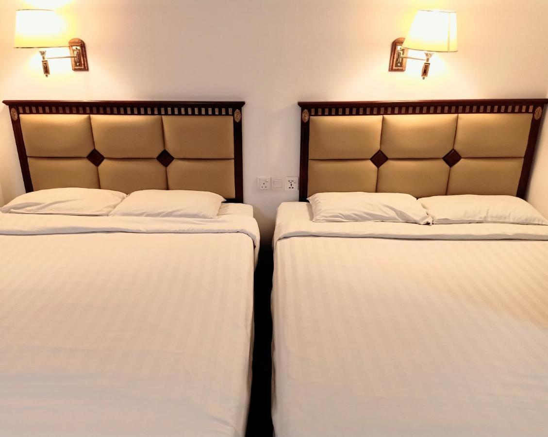 Super Oyo 90464 Borneo Suites Hotel Kota Kinabalu Extérieur photo
