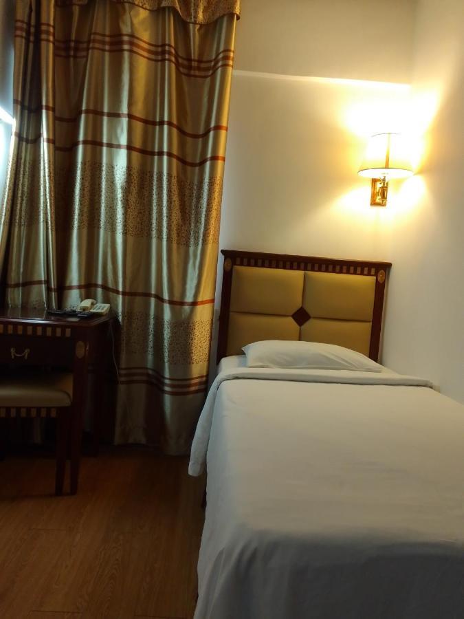 Super Oyo 90464 Borneo Suites Hotel Kota Kinabalu Extérieur photo