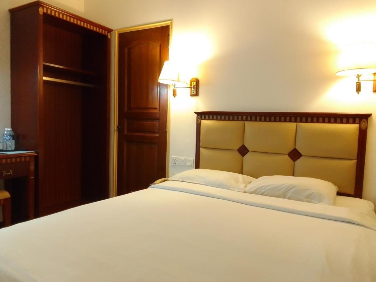 Super Oyo 90464 Borneo Suites Hotel Kota Kinabalu Extérieur photo