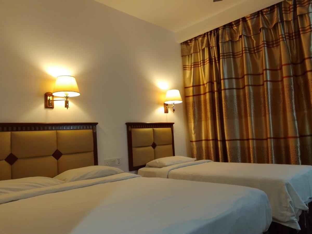 Super Oyo 90464 Borneo Suites Hotel Kota Kinabalu Extérieur photo