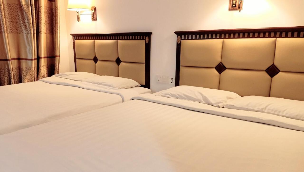 Super Oyo 90464 Borneo Suites Hotel Kota Kinabalu Extérieur photo