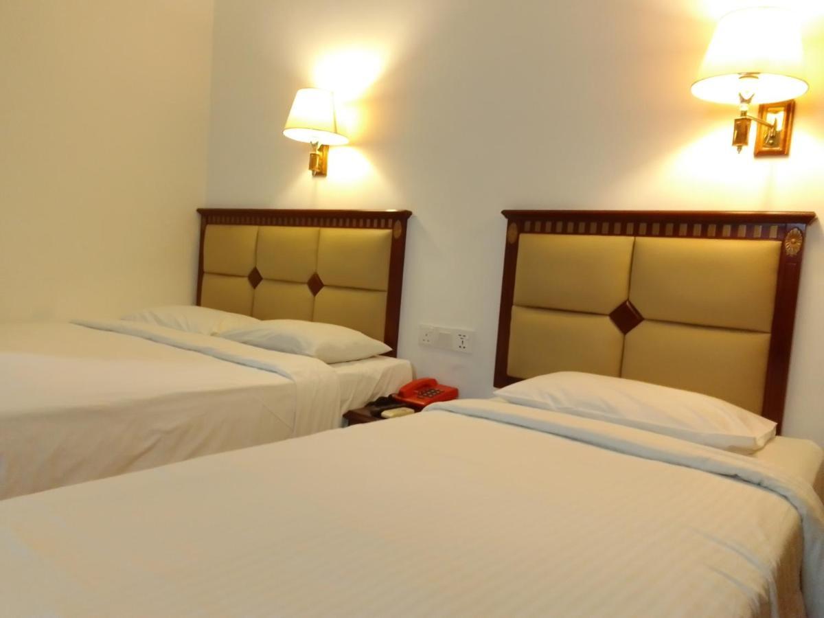 Super Oyo 90464 Borneo Suites Hotel Kota Kinabalu Extérieur photo